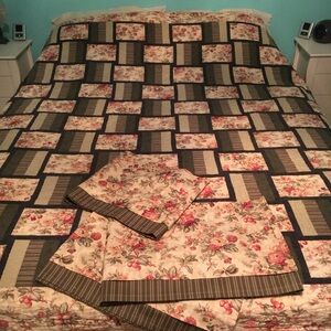 Hand made and machine quilted quilt with matching curtain valances.